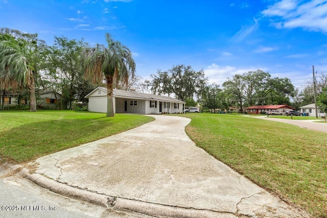 single story home with a front lawn