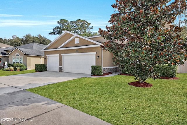 view of front of property with a garage and a front yard