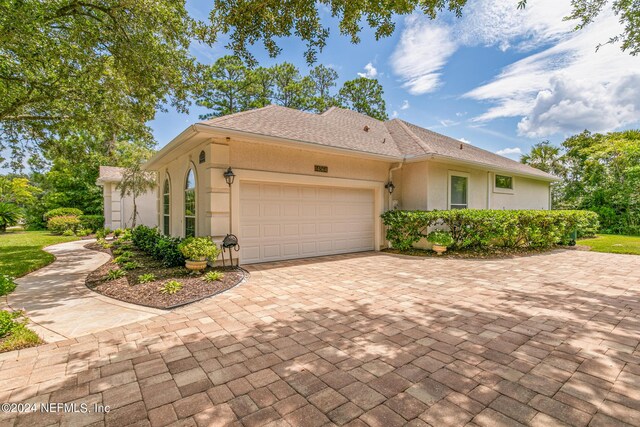 view of front of house with a garage