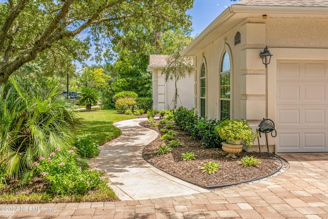 view of yard with a garage