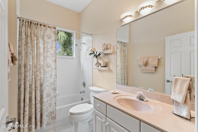 full bathroom featuring tile patterned floors, vanity, toilet, and shower / bathtub combination with curtain