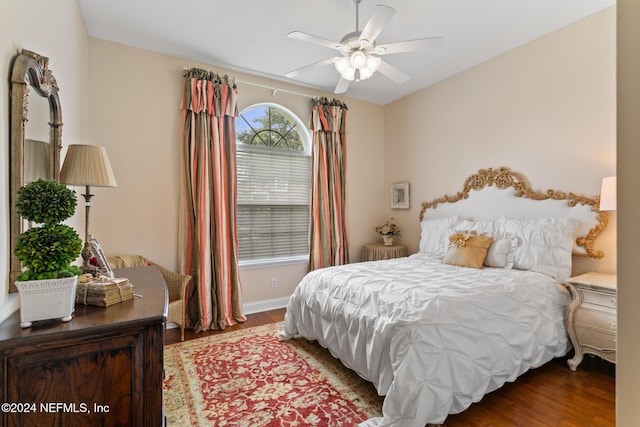 bedroom featuring hardwood / wood-style flooring and ceiling fan