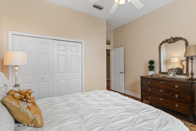 bedroom featuring ceiling fan, lofted ceiling, and a closet