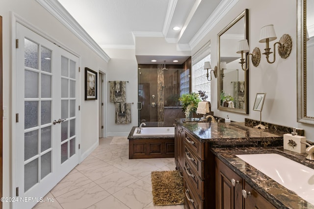 bathroom featuring vanity, crown molding, shower with separate bathtub, and french doors