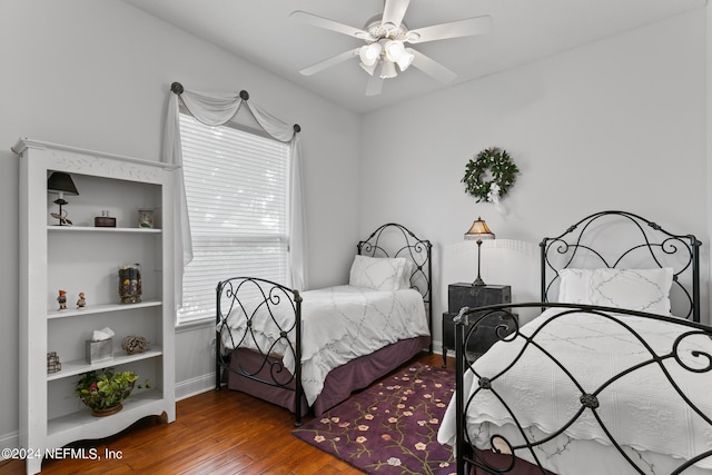 bedroom featuring ceiling fan and hardwood / wood-style floors