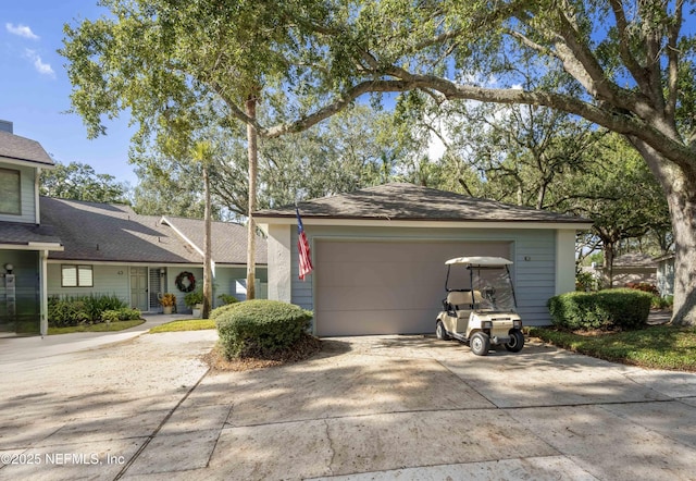 ranch-style home featuring a garage