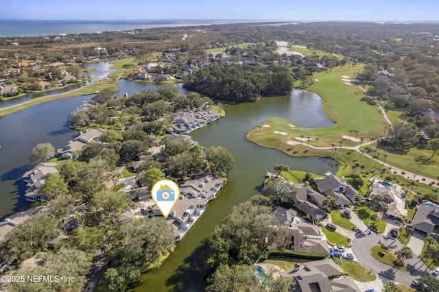 bird's eye view with a water view