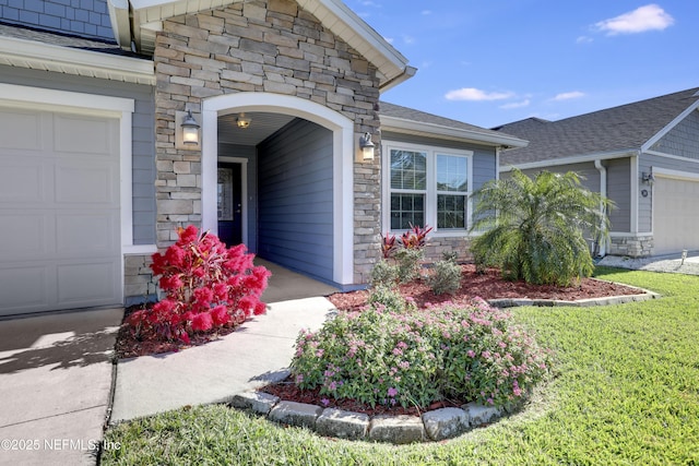 doorway to property featuring a garage