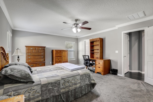 bedroom with dark colored carpet, ceiling fan, crown molding, and a textured ceiling