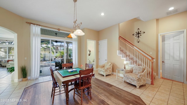 dining area with light tile patterned floors