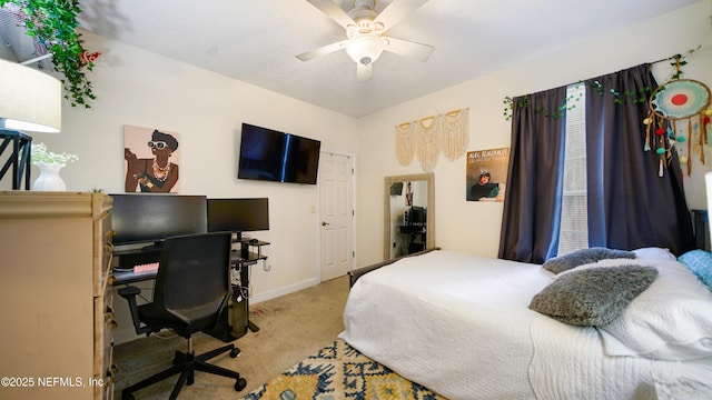 carpeted bedroom with ceiling fan