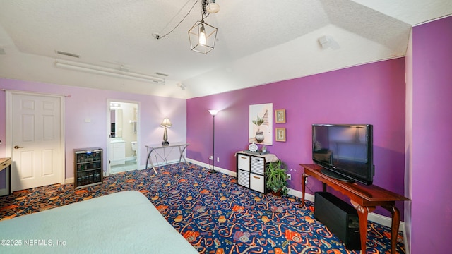 carpeted living room featuring a textured ceiling, beverage cooler, and vaulted ceiling