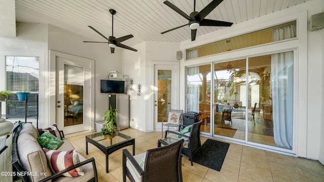 sunroom / solarium with ceiling fan and wood ceiling