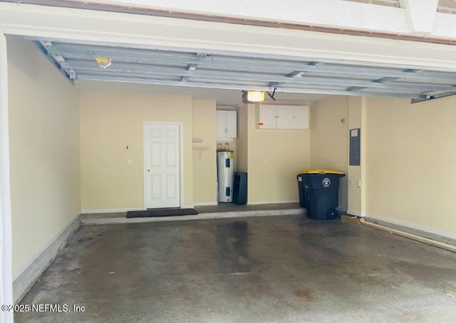 garage featuring electric water heater, electric panel, and a garage door opener