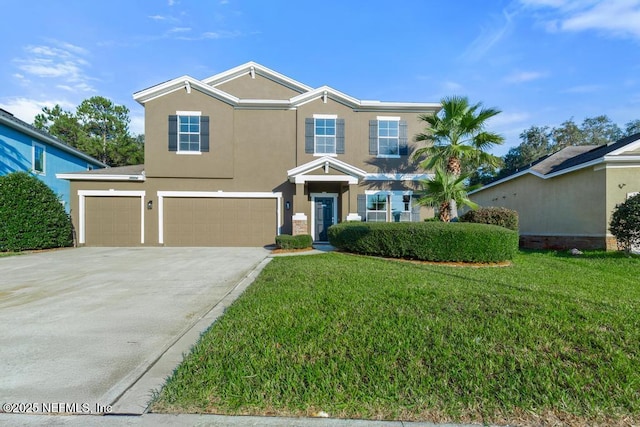 view of front facade with a front yard and a garage