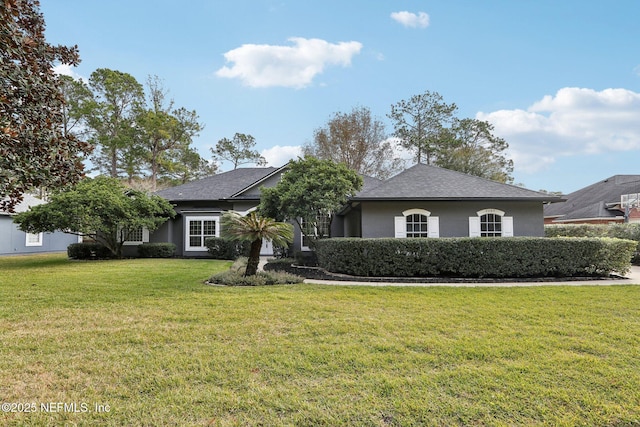 view of front of home with a front lawn