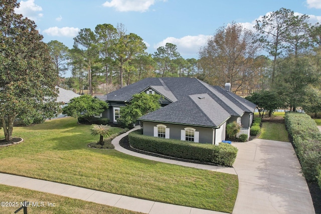 view of front of home featuring a front lawn