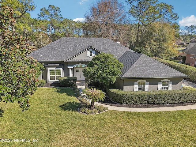 view of front of home featuring a front yard