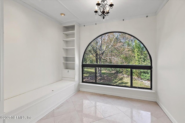 interior space featuring a notable chandelier, light tile patterned floors, and crown molding