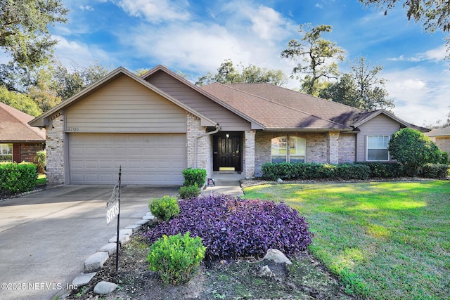 ranch-style house featuring a garage and a front lawn