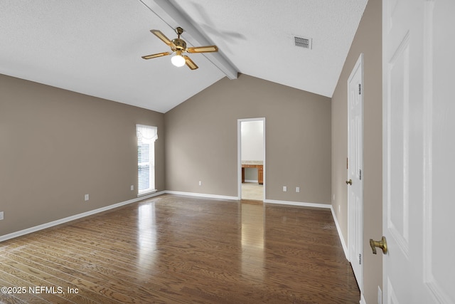 unfurnished room with vaulted ceiling with beams, dark hardwood / wood-style flooring, a textured ceiling, and ceiling fan