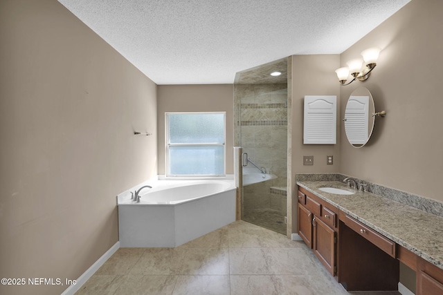 bathroom with tile patterned flooring, vanity, separate shower and tub, and a textured ceiling