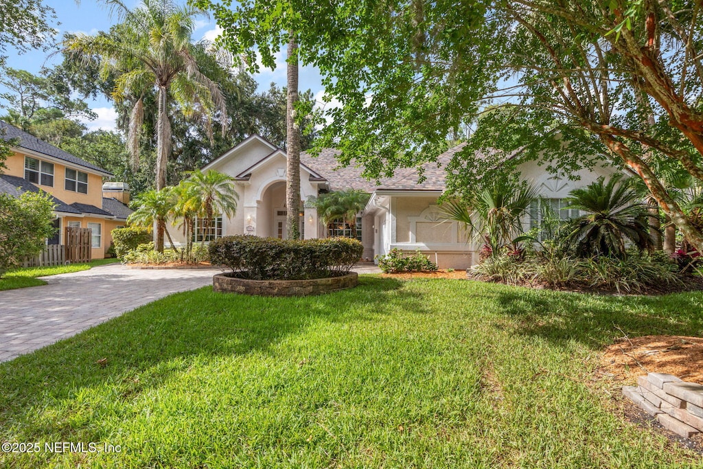 view of front of house with a front lawn