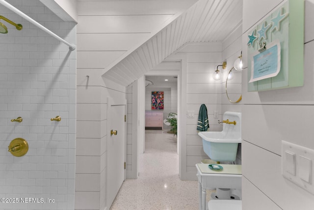 bathroom featuring sink and a shower