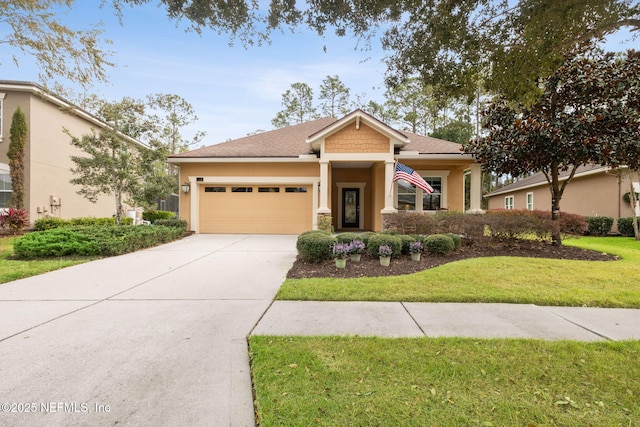 view of front facade featuring a front yard and a garage