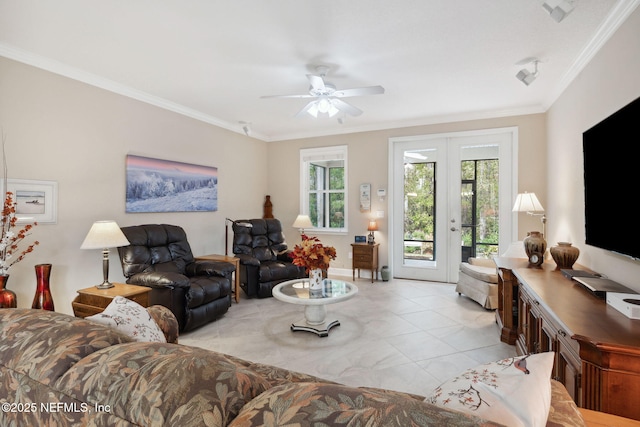 tiled living room with ceiling fan, ornamental molding, and french doors