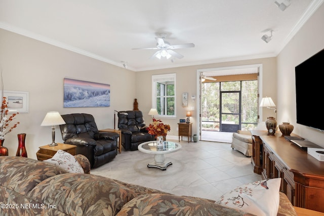 living room featuring light tile patterned floors, ceiling fan, and crown molding