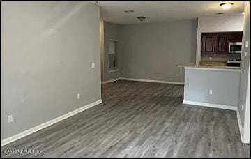 interior space with dark wood-type flooring