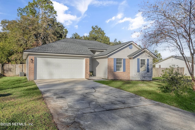 ranch-style home featuring central AC unit, a front yard, and a garage