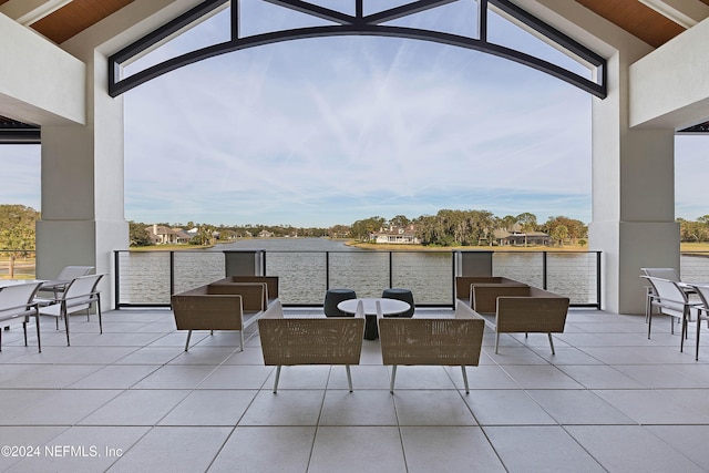 view of patio / terrace featuring a water view and an outdoor hangout area