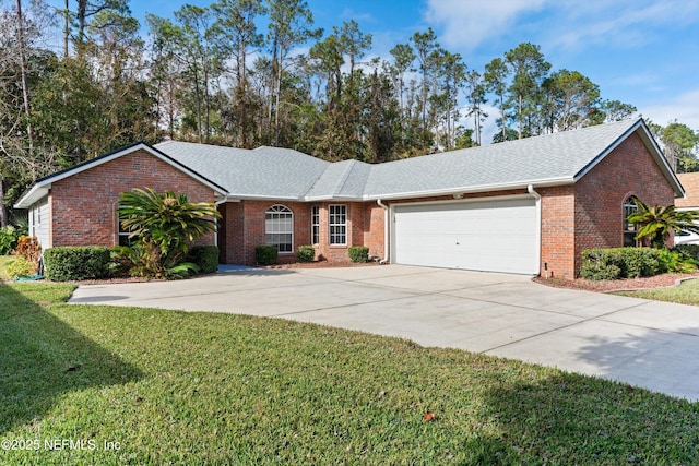 ranch-style home with a front yard and a garage