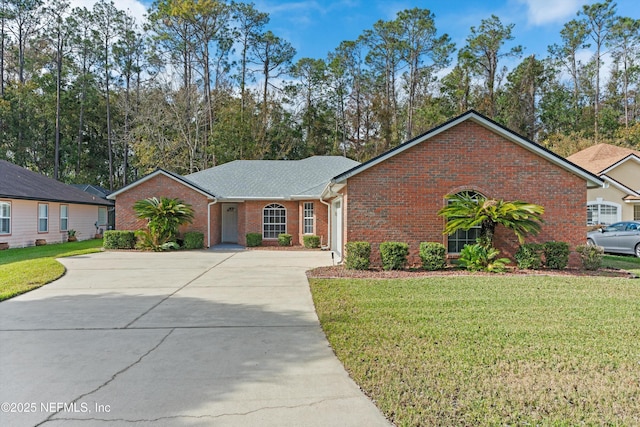 single story home featuring a front yard