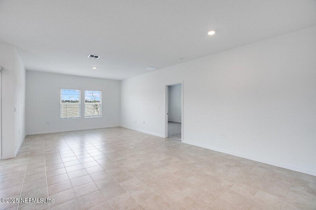 view of tiled spare room