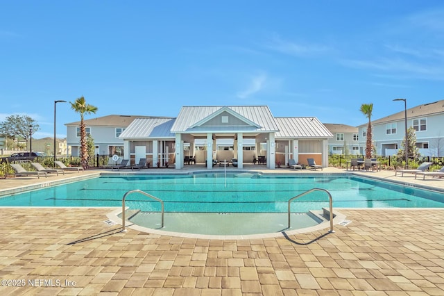 view of pool featuring a patio area