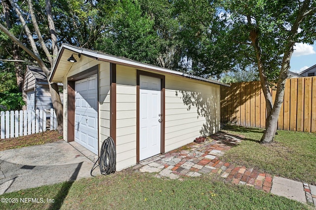 view of outbuilding with a garage