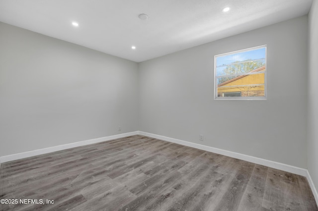 unfurnished room featuring light wood-type flooring