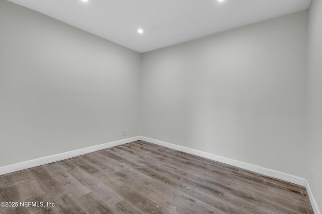 empty room with light hardwood / wood-style floors