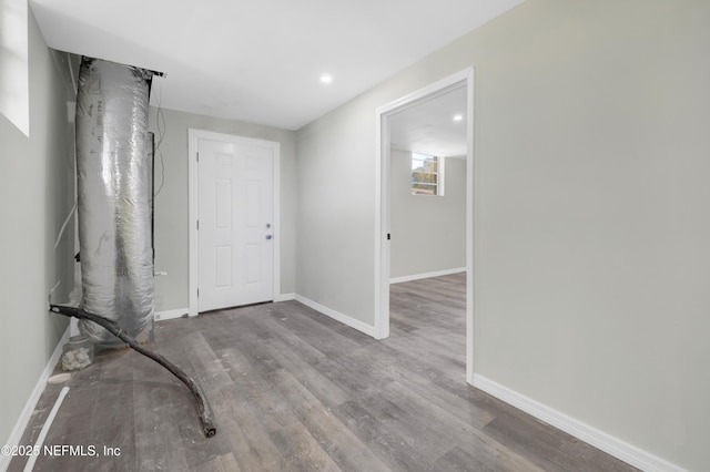 entrance foyer featuring hardwood / wood-style floors