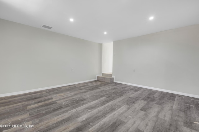 spare room featuring hardwood / wood-style floors