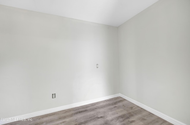 empty room featuring light hardwood / wood-style floors