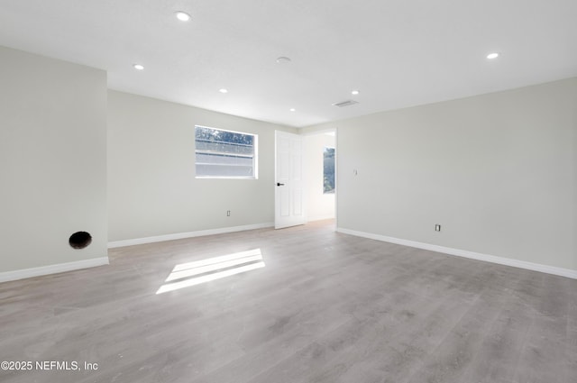 unfurnished room featuring light wood-type flooring