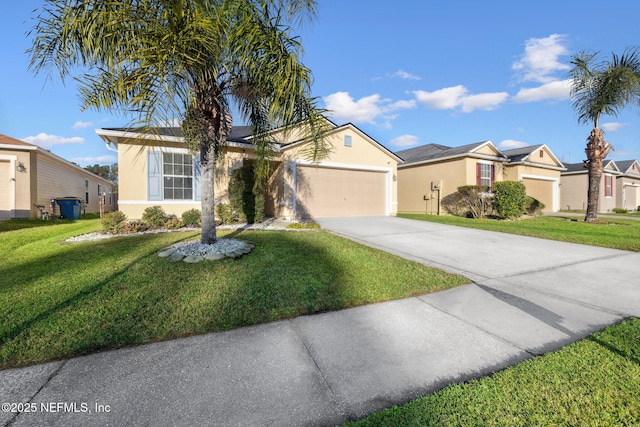 single story home with a front yard and a garage