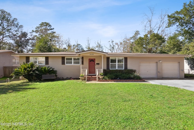 ranch-style house with a front lawn and a garage