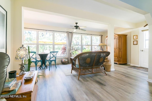 interior space featuring light hardwood / wood-style floors and ceiling fan