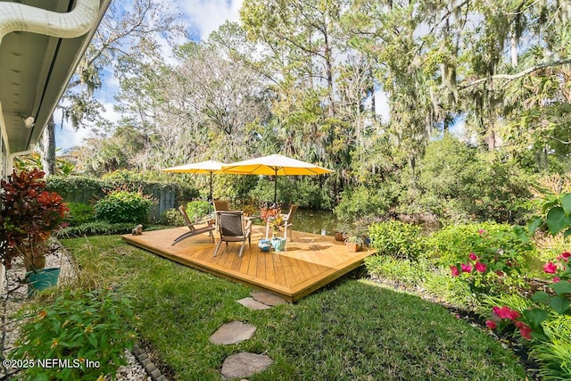 view of yard with a deck