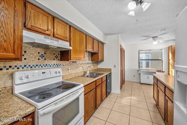 kitchen featuring dishwasher, sink, tasteful backsplash, white range with electric cooktop, and light tile patterned flooring